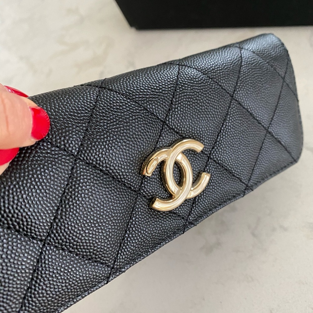 CHANEL Black Quilted Wallet with Gold Logo